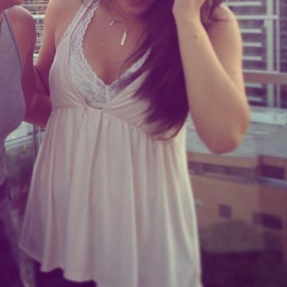 Free People babydoll tank w cute crossback detail!
